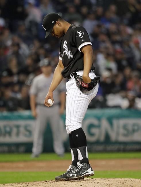 Chicago White Sox starting pitcher Reynaldo Lopez looks down after New York Yankees' Gleyber Torres hit a two-run home run during the fourth inning of a baseball game in Chicago, Saturday, June 15, 2019. (AP Photo/Nam Y. Huh)