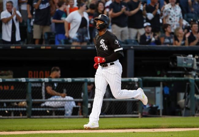 Chicago White Sox's Eloy Jimenez, runs the bases after hitting a solo home run off of Oakland Athletics' Tanner Roark during the fifth inning of a baseball game Saturday, Aug. 10, 2019, in Chicago. (AP Photo/Kamil Krzaczynski)