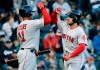 Boston Red Sox's Michael Chavis, right, celebrates with Rafael Devers after hitting a solo home run against the Chicago White Sox during the third inning of a baseball game in Chicago, Saturday, May 4, 2019. (AP Photo/Nam Y. Huh)