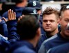 Seattle Mariners' Daniel Vogelbach, right, celebrates with teammates in the dugout during the third inning of a baseball game against the Chicago White Sox in Chicago, Sunday, April 7, 2019. Seattle Mariners' Daniel Vogelbach hit a three-run double. (AP Photo/Nam Y. Huh)