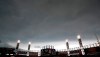 Storm clouds move in over Guaranteed Rate Field during the fourth inning of a baseball game between the Minnesota Twins and the Chicago White Sox, Sunday, June 30, 2019, in Chicago. (AP Photo/Jeff Haynes)