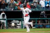 Chicago White Sox's Eloy Jimenez celebrates as he rounds the bases after hitting a solo home run off of Detroit Tigers' Edwin Jackson during the seventh inning of Game 1 of a baseball doubleheader, Saturday, Sept. 28, 2019, in Chicago. (AP Photo/Kamil Krzaczynski)