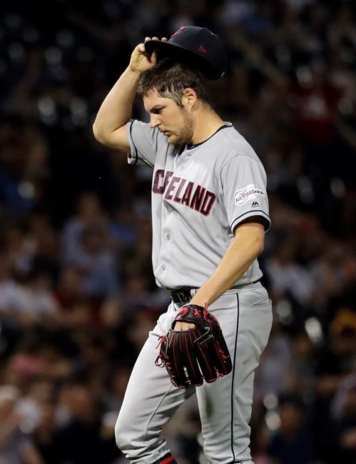 Cleveland Indians starting pitcher Trevor Bauer cools off during the fourth inning of a baseball game against the Chicago White Sox in Chicago, Friday, May 31, 2019. (AP Photo/Nam Y. Huh)