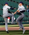 Tampa Bay Rays left fielder Austin Meadows, right, celebrates with shortstop Willy Adams after the Rays defeated the Chicago White Sox 10-5 in a baseball game in Chicago, Tuesday, April 9, 2019. (AP Photo/Nam Y. Huh)