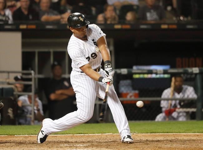 Chicago White Sox's Jose Abreu hits a three-run walk-off home run during the 12th inning of a baseball game against the Detroit Tigers Wednesday, July 3, 2019, in Chicago. The White Sox won 9-6. (AP Photo/Charles Rex Arbogast)