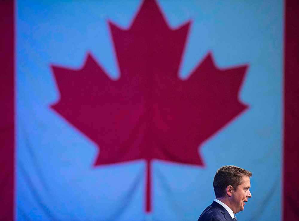 Andrew Vaughan / The Canadian Press
Conservative Party of Canada leader Andrew Scheer delivers remarks at the party's national policy convention in Halifax on Friday, Aug. 24, 2018.