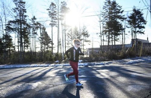 Brenda Kennedy goes for an early-morning run in her Cole Harbour, N.S. neighbourhood on Saturday, January 19, 2019. Kennedy is one of the first patients in the world to have the Cartiva synthetic cartilage implanted in her left big toe. And, five years later, she had her right big toe done. In both cases, she resumed running within ten weeks of surgery. THE CANADIAN PRESS/Darren Calabrese