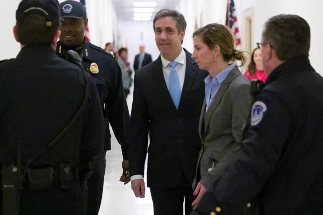 Michael Cohen, President Donald Trump's former personal lawyer, arrives to testify before the House Oversight and Reform Committee, on Capitol Hill, Wednesday, Feb. 27, 2019, in Washington. (AP Photo/Alex Brandon)