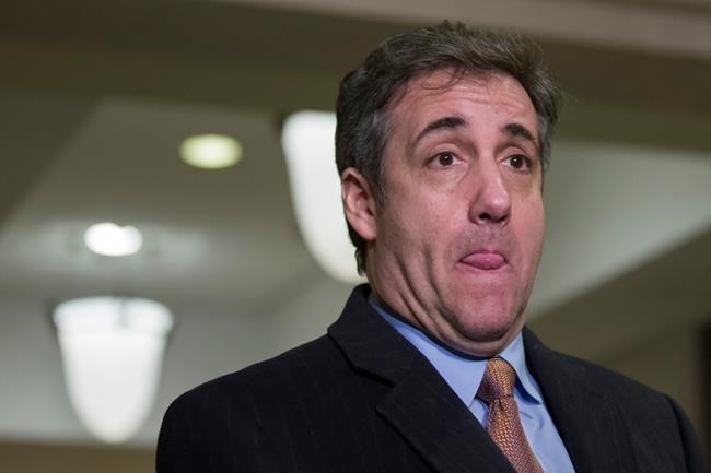 Michael Cohen, President Donald Trump's former lawyer, pauses while speaking as he departs after testifying before a closed-door session of the House Intelligence Committee on Capitol Hill, Wednesday, March 6, 2019, in Washington. (AP Photo/Alex Brandon)