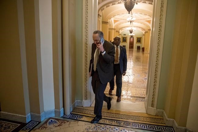 Senate Minority Leader Sen. Chuck Schumer of N.Y. arrives on Capitol Hill in Washington, Thursday, Jan. 24, 2019. (AP Photo/Andrew Harnik)