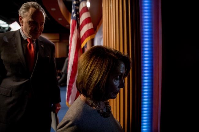 House Speaker Nancy Pelosi of Calif., and Senate Minority Leader Sen. Chuck Schumer of N.Y., leave a news conference on Capitol Hill in Washington, Friday, Jan. 25, 2019, after President Donald Trump announces a deal to reopen the government for three weeks. (AP Photo/Andrew Harnik)