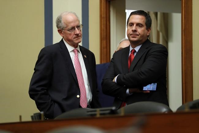 Ranking member Rep. Devin Nunes, R-Calif., talks to Rep. Mike Conaway, R-Texas, after Acting Director of National Intelligence Joseph Maguire testified before the House Intelligence Committee on Capitol Hill in Washington, Thursday, Sept. 26, 2019. (AP Photo/Andrew Harnik)
