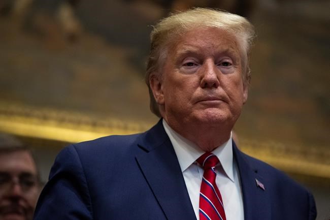 President Donald Trump pauses during an event on healthcare prices in the Roosevelt Room of the White House, Friday, Nov. 15, 2019, in Washington. (AP Photo/ Evan Vucci)