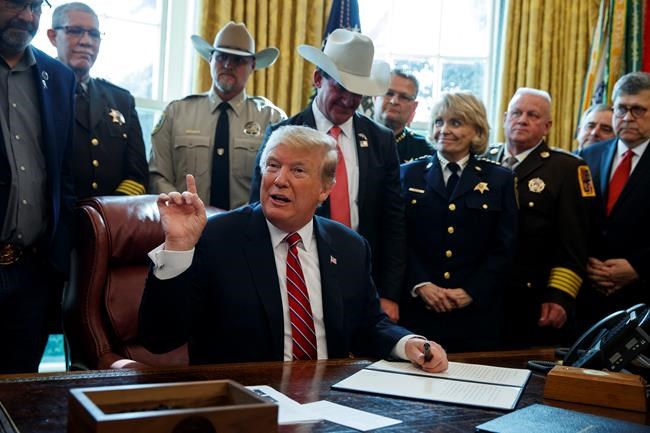 President Donald Trump speaks about border security in the Oval Office of the White House, Friday, March 15, 2019, in Washington. Trump issued the first veto of his presidency, overruling Congress to protect his emergency declaration for border wall funding. (AP Photo/Evan Vucci)