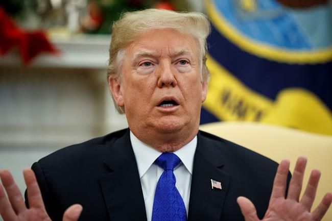 President Donald Trump speaks during a meets with Democratic leaders the Oval Office of the White House, Tuesday, Dec. 11, 2018, in Washington. (AP Photo/Evan Vucci)