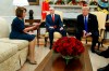 Vice President Mike Pence, center, looks on as House Minority Leader Rep. Nancy Pelosi, D-Calif., and President Donald Trump argue during a meeting in the Oval Office of the White House, Tuesday, Dec. 11, 2018, in Washington. (AP Photo/Evan Vucci)