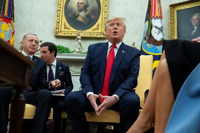 President Donald Trump speaks during a meeting with Turkish President Recep Tayyip Erdogan in the Oval Office of the White House, Wednesday, Nov. 13, 2019, in Washington. (AP Photo/ Evan Vucci)
