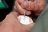 Former Major League Baseball pitcher Roger�Clemens autographs as baseball as he leaves federal court, Thursday, May 17, 2012, in Washington. (AP Photo/Haraz N. Ghanbari)