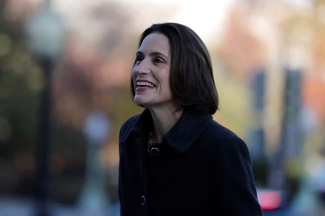 Former White House national security aide Fiona Hill arrives to testify before the House Intelligence Committee on Capitol Hill in Washington, Thursday, Nov. 21, 2019, during a public impeachment hearing of President Donald Trump's efforts to tie U.S. aid for Ukraine to investigations of his political opponents. (AP Photo/Julio Cortez)
