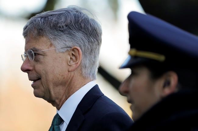 Top U.S. diplomat in Ukraine William Taylor arrives to testify before the House Intelligence Committee on Capitol Hill in Washington, Wednesday, Nov. 13, 2019, during the first public impeachment hearings of President Donald Trump's efforts to tie U.S. aid for Ukraine to investigations of his political opponents. (AP Photo/Julio Cortez)