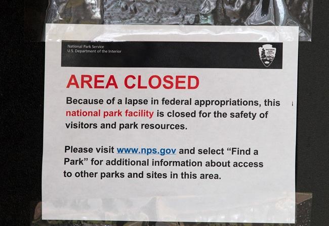 A closed sign is displayed on a door at the Lincoln Memorial in Washington, Tuesday, Jan. 1, 2019, as a partial government shutdown stretches into its third week. A high-stakes move to reopen the government will be the first big battle between Nancy Pelosi and President Donald Trump as Democrats come into control of the House. (AP Photo/Jose Luis Magana)