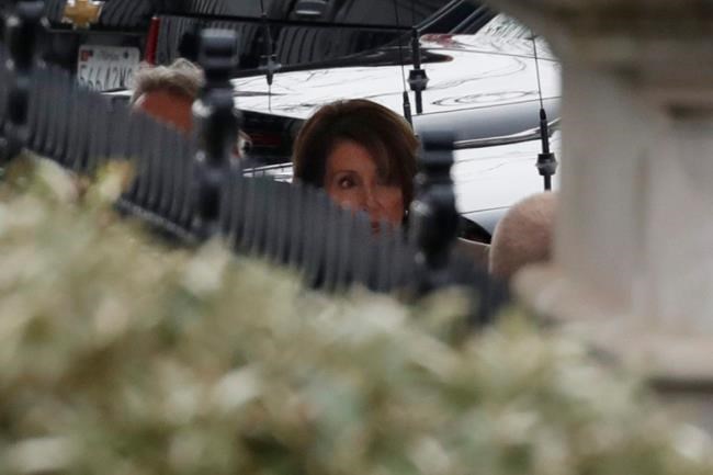 House Speaker Nancy Pelosi of California, center, arrives to speak with President Donald Trump on border security, Friday, Jan. 4, 2019, at the White House in Washington. (AP Photo/Jacquelyn Martin)