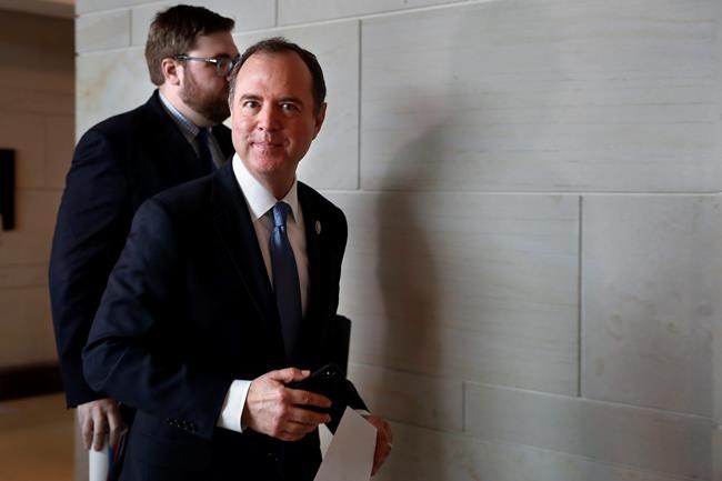 House Intelligence Committee Chairman Adam Schiff, D-Calif., right, leaves a closed-door meeting of the House Intelligence Committee with testimony from Michael Cohen, President Donald Trump's former personal lawyer, Monday, Feb. 5, 2018, to attend a vote on Capitol Hill in Washington. (AP Photo/Jacquelyn Martin)