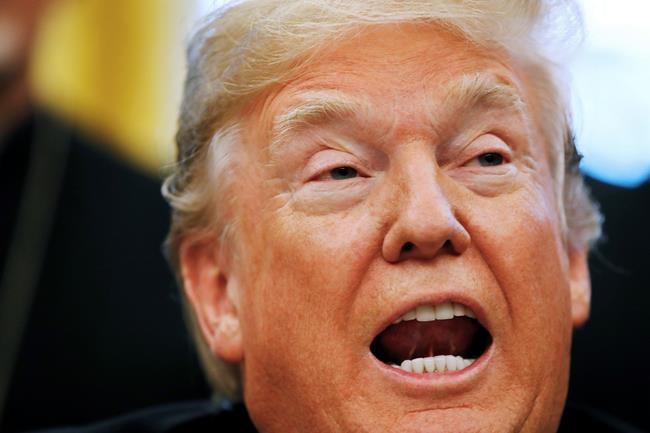 President Donald Trump speaks before signing H.R. 390, the