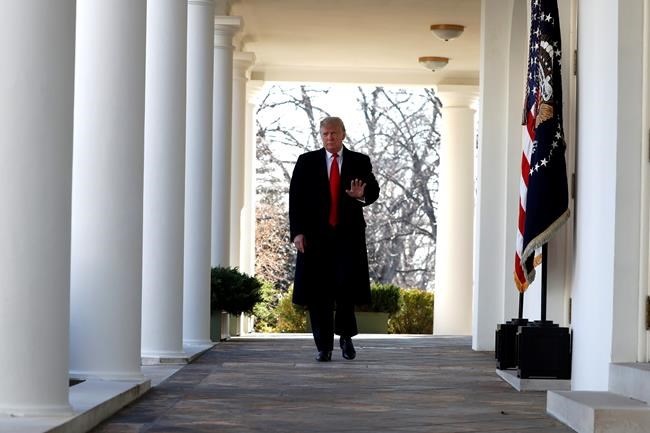 President Donald Trump walks from the Oval Office to speak in the Rose Garden of the White House, Friday, Jan 25, 2019, in Washington. (AP Photo/Jacquelyn Martin)