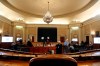 As seen from the dais, photographers prepare in the hearing room where the House will begin public impeachment inquiry hearings Wednesday, on Tuesday, Nov. 12, 2019, on Capitol Hill in Washington. With the bang of a gavel, House Intelligence Committee Chairman Adam Schiff will open the hearings into President Donald Trump's pressure on Ukraine to investigate Democratic rival Joe Biden's family. (AP Photo/Jacquelyn Martin)