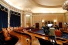 A television crew prepares in the hearing room where the House will begin public impeachment inquiry hearings Wednesday, on Tuesday, Nov. 12, 2019, on Capitol Hill in Washington. With the bang of a gavel, House Intelligence Committee Chairman Adam Schiff will open the hearings into President Donald Trump's pressure on Ukraine to investigate Democratic rival Joe Biden's family. (AP Photo/Jacquelyn Martin)