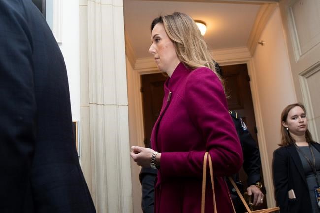 Jennifer Williams, an aide to Vice President Mike Pence, arrives to testify before the House Intelligence Committee on Capitol Hill in Washington, Tuesday, Nov. 19, 2019, during a public impeachment hearing of President Donald Trump's efforts to tie U.S. aid for Ukraine to investigations of his political opponents. (AP Photo/Manuel Balce Ceneta)
