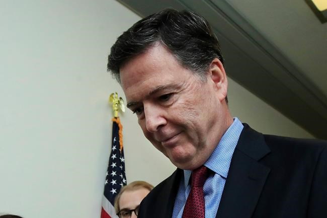 Former FBI Director James Comey speaks to reporters after testifying under subpoena behind closed doors before the House Judiciary and Oversight Committee on Capitol Hill in Washington, Friday, Dec. 7, 2018. (AP Photo/Manuel Balce Ceneta)