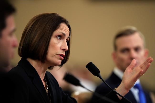 Former White House national security aide Fiona Hill, and David Holmes, a U.S. diplomat in Ukraine, right, testify before the House Intelligence Committee on Capitol Hill in Washington, Thursday, Nov. 21, 2019, during a public impeachment hearing of President Donald Trump's efforts to tie U.S. aid for Ukraine to investigations of his political opponents. (AP Photo/Manuel Balce Ceneta)