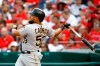 Pittsburgh Pirates' Melky Cabrera watches his solo home run in the sixth inning of a baseball game against the Washington Nationals, Saturday, April 13, 2019, in Washington. (AP Photo/Patrick Semansky)
