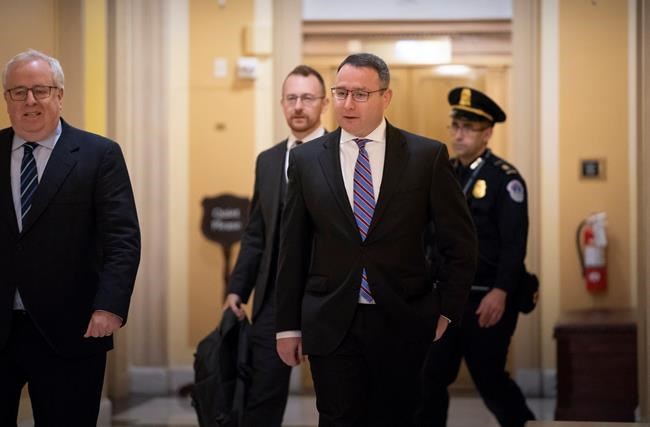 Former National Security Council Director for European Affairs Lt. Col. Alexander Vindman returns to the Capitol to review transcripts of his testimony in the impeachment inquiry of President Donald Trump, in Washington, Thursday, Nov. 7, 2019. (AP Photo/J. Scott Applewhite)