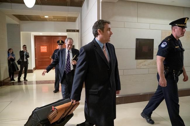 Michael Cohen, President Donald Trump's former lawyer, departs following a full day of testimony with the House Intelligence Committee behind closed doors as he prepares for a three-year prison sentence for lying to Congress and other charges, at the Capitol in Washington, Wednesday, March 6, 2019. Cohen told reporters he will