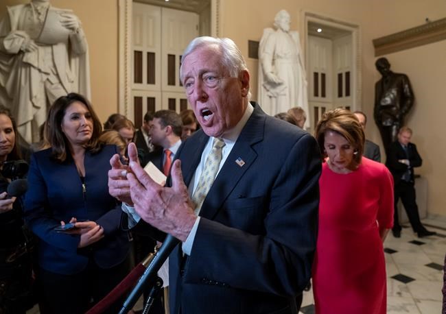House Majority Leader Steny Hoyer, D-Md., center, and Speaker of the House Nancy Pelosi, D-Calif., push back on President Donald Trump's demand for funding to build a wall on the US-Mexico border as the partial government shutdown is in its second week, at the Capitol in Washington, Thursday, Jan. 3, 2019. (AP Photo/J. Scott Applewhite)