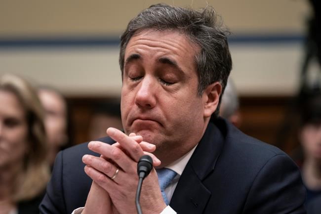 Michael Cohen, President Donald Trump's former personal lawyer, becomes emotional as he finishes a day of testimony to the House Oversight and Reform Committee, on Capitol Hill in Washington, Wednesday, Feb. 27, 2019. (AP Photo/J. Scott Applewhite)