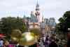 Jae C. Hong / The Associated Press
In this Jan. 22, 2015 file photo, visitors walk toward the Sleeping Beauty's Castle in the background at Disneyland Resort in Anaheim.