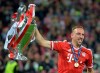 FILE - In this May 25, 2013 file photo, Bayern Munich's Franck Ribery of France lifts the trophy after winning the Champions League Final at Wembley Stadium in London. France great Franck Ribery is joining Fiorentina as the Italian club aims for a renaissance under new American ownership. (AP Photo/Martin Meissner)