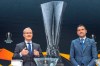 UEFA deputy secretary general Giorgio Marchetti, left, and former Spanish football player Andres Palop, right, ambassador for the UEFA Europa League, speak during the drawing of the games for the Europa League 2018/19 Round of 16, at the UEFA headquarters in Nyon, Switzerland, Friday, Feb. 22, 2019. (Martial Trezzini/Keystone via AP)