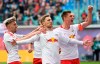 FILE - In this April 27, 2019 file photo, Leipzig's Emil Forsberg, 2nd right, celebrates after scoring a goal during the German Bundesliga soccer match between RB Leipzig and SC Freiburg in Leipzig, Germany. Fifty-four major titles compared to none, 119 years of existence against 10, some 290,000 club members versus 17 ‚Äì the contrast between Bayern Munich and Leipzig could hardly be greater. The clubs meet in the German Cup final on Saturday, when Leipzig will bid for its first ever title and Bayern will hope to bring a happy end to a testing season with another domestic double. (AP Photo/Jens Meyer)