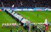 Fans tear down a symbolic wall on the day of the 30th anniversary of the fall of the Berlin Wall prior the Bundesliga soccer match between Hertha BSC Berlin and RB Leipzig at the stadium in Berlin, Germany, Saturday, Nov. 9, 2019. (Soeren Stache/dpa via AP)