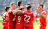Duesseldorf's team celebrates during the Bundesliga soccer match between Hertha BSC Berlin and Fortuna Duesseldorf in Berlin, Germany, Saturday, April 6, 2019. (Andreas Gora/dpa via AP)