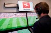 File - In this July 20, 2017 file photo, referee Sascha Stegemann sits in front of screens showing match sequences in a video assistant referee center in Cologne, Germany. Players, coaches and former referees have united in their criticism of the Bundesliga's video assistant referee after another weekend of questionable decisions in Germany's top soccer league.(Rolf Vennenbernd/dpa via AP)