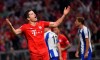 Bayern Munich's Robert Lewandowski celebrates after scoring the opening goal during the German Bundesliga soccer match between Bayern Munich and Hertha BSC Berlin in Munich on Friday, Aug. 16, 2019. (Matthias Balk/dpa via AP)