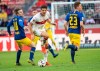 Stuttgart's Mario Gomez, center, challenges for the ball with Leipzig's Emil Forsberg, left, during the German Bundesliga soccer match between VfB Stuttgart and RB Leipzig in Stuttgart, Saturday, Feb. 16, 2019. (Sebastian Gollnow/dpa via AP)