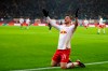 Leipzig's Timo Werner celebrates his side third goal during the German Bundesliga soccer match between RB Leipzig and FSV Mainz 05 in Leipzig, Sunday, Dec. 16, 2018. (Jan Woitas/dpa via AP)