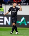 File - In this Thursday, Oct. 4, 2018 file photo, Frankfurt's Luka Jovic celebrates his side's third goal during a Europa League group H soccer match between Eintracht Frankfurt and Lazio Rom in Frankfurt, Germany. (AP Photo/Michael Probst, file)